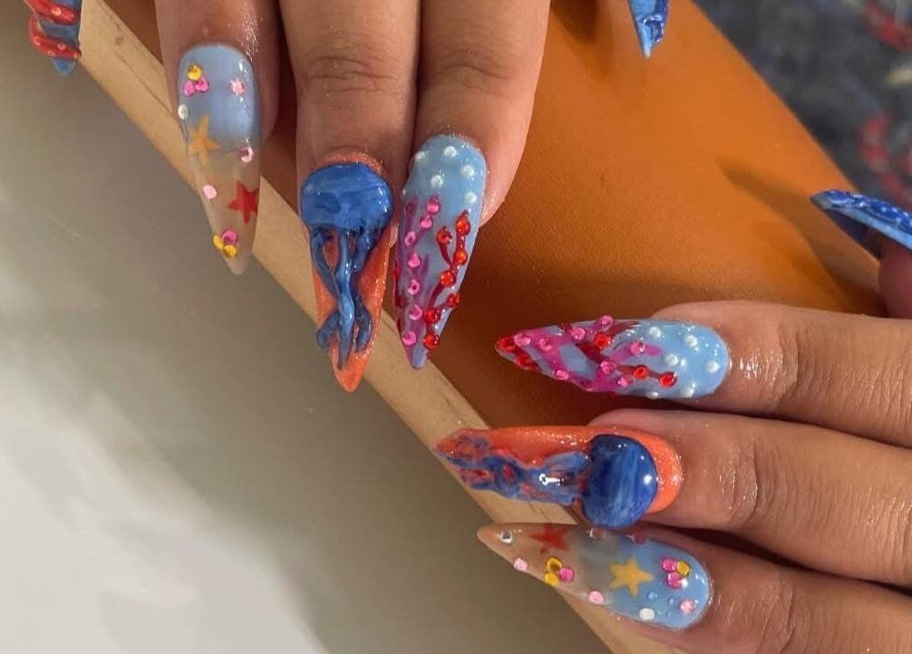 Vibrant oceanic-themed 3D nail art design at Water’s Edge Aesthetics, Saint John, New Brunswick, CA.
