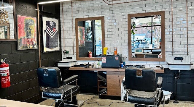 Barber chairs and decor at Uncle Joes Barber - Fremantle, Western Australia, AU, showcasing classic style.