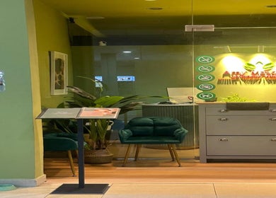 Entrance of Amy Mascara Javanese Wellness @Larkin Sentral in Johor Bahru, featuring plants and cozy seating.