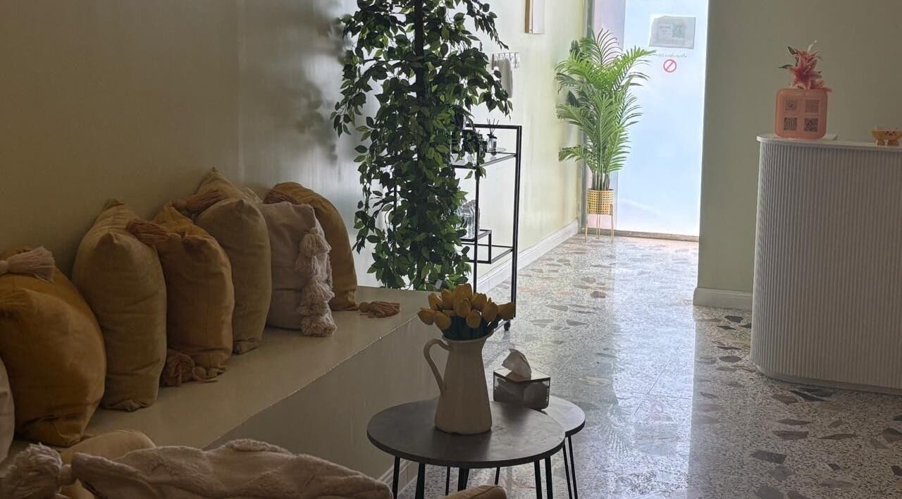 Cozy seating area in Brillante Spa, Riyadh, Riyadh Province, SA, with plants and cushions enhancing relaxation.