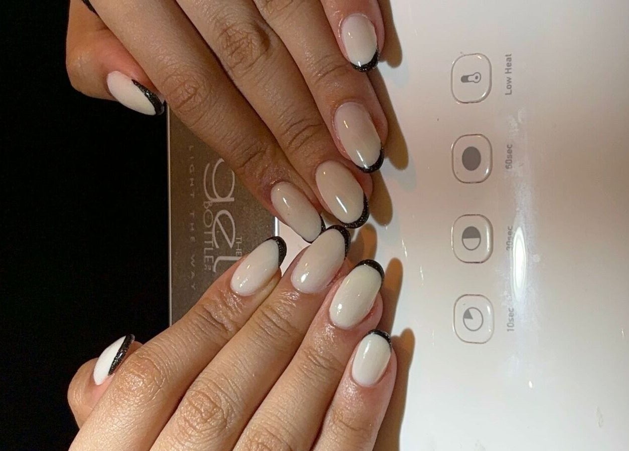Elegant black and white nails at Brillante Spa in Riyadh, Riyadh Province, SA, effortlessly styled.