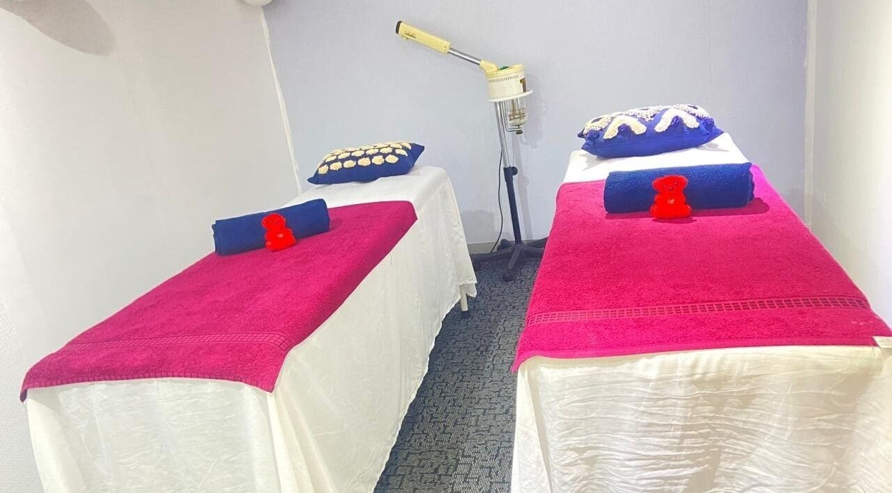 Two massage tables in a tranquil setup at Absolutely The Best Beauty Spa And Nails, Randburg, Gauteng, ZA.