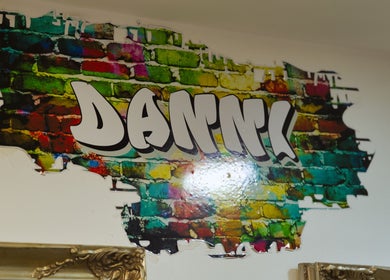 Colorful graffiti mural at Danni at Flawless, Wigan, England, GB, showcasing artistic venue ambiance.