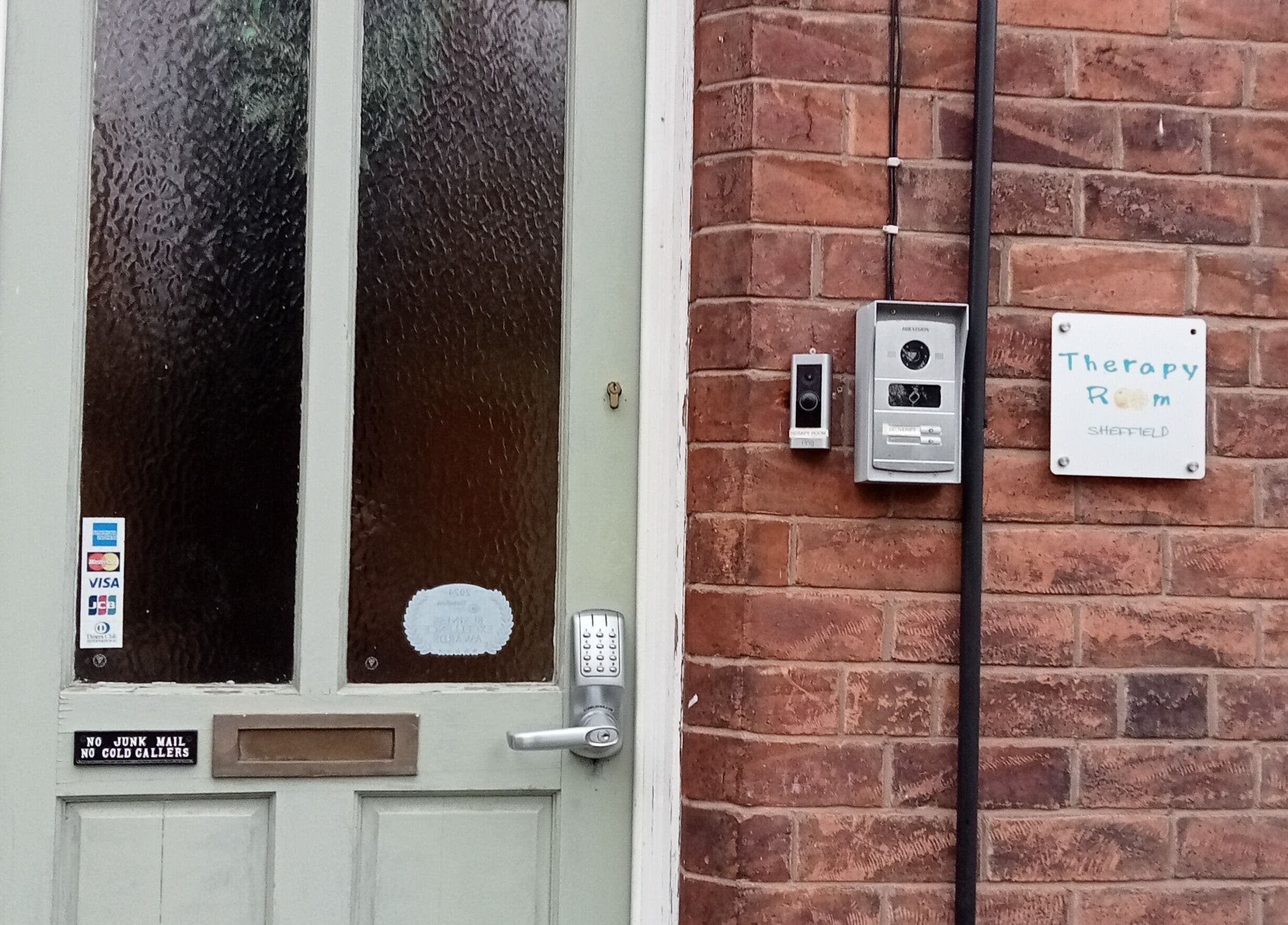 Entrance to Therapy Room Sheffield S7 with keypad and sign, located in Sheffield, England, GB.