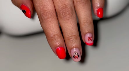 Colorful nail art with cartoon design by Mobile nails by Karli in Stilton, England, GB.