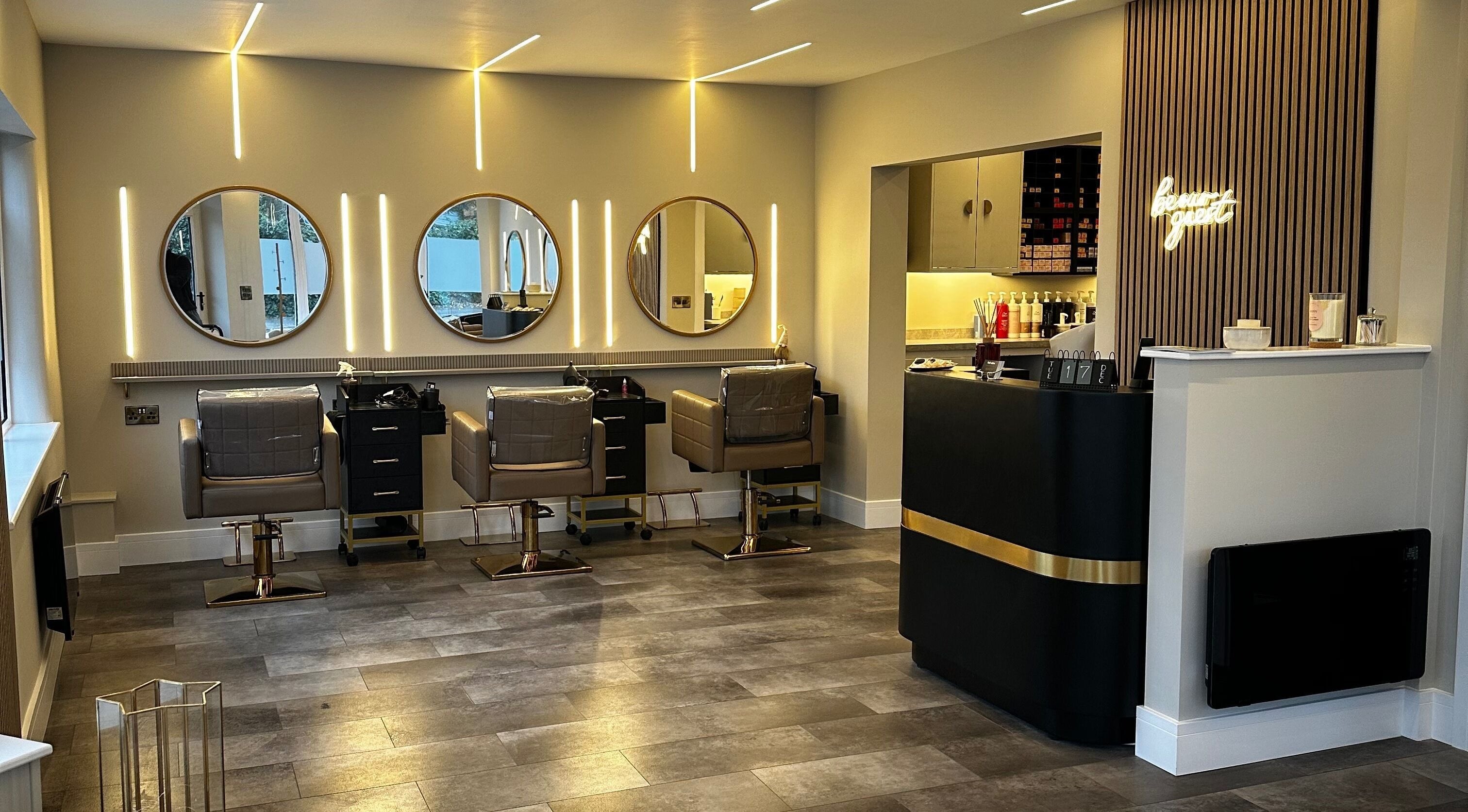 Halt Salon interior in Nottingham, GB. Features modern styling stations with mirrors and sleek decor.