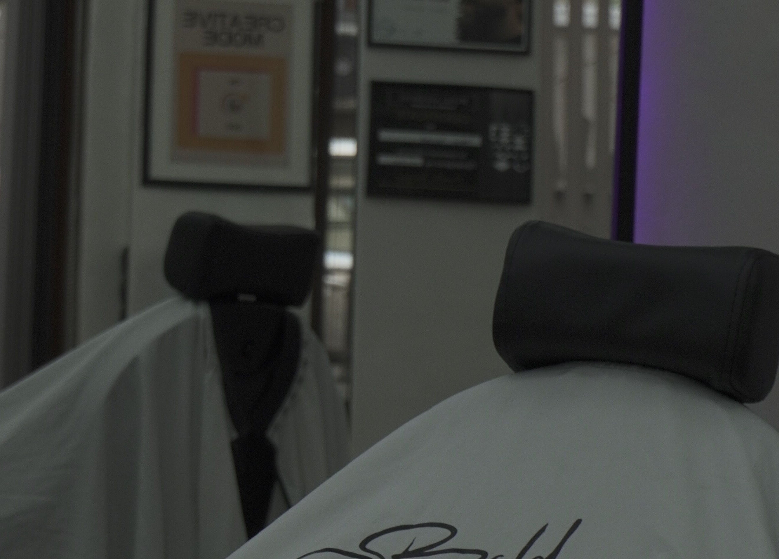 Stylish barber chair at Bald Barber Studio, Varna, Varna, BG, epitomizing modern grooming in a sleek setting.