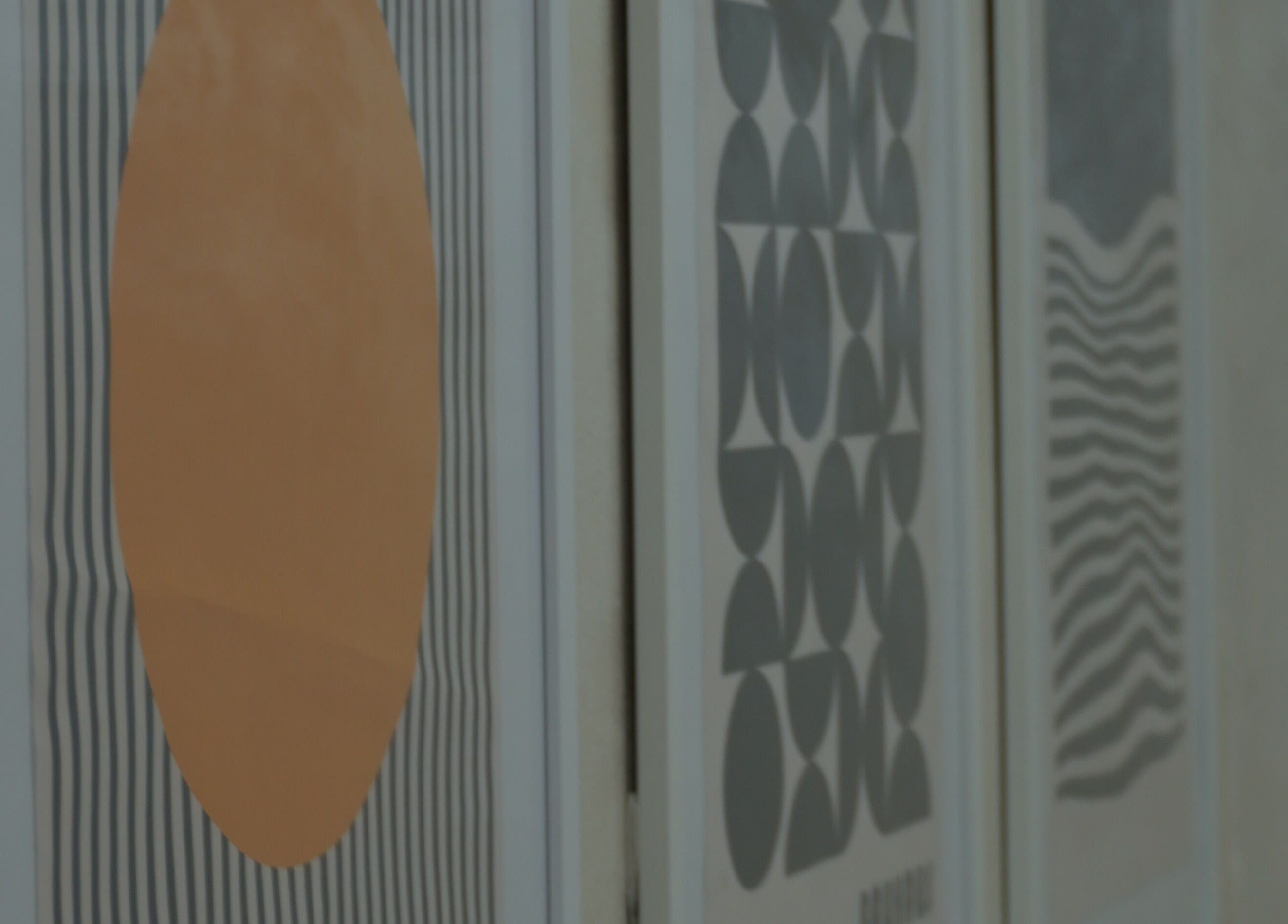 Stylish framed artwork on the wall of Bald Barber Studio, Varna, Varna, BG showcasing modern design.