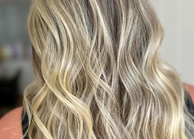 Blonde wavy hair styled at Lavender Salon, Bradworthy, England, GB.
