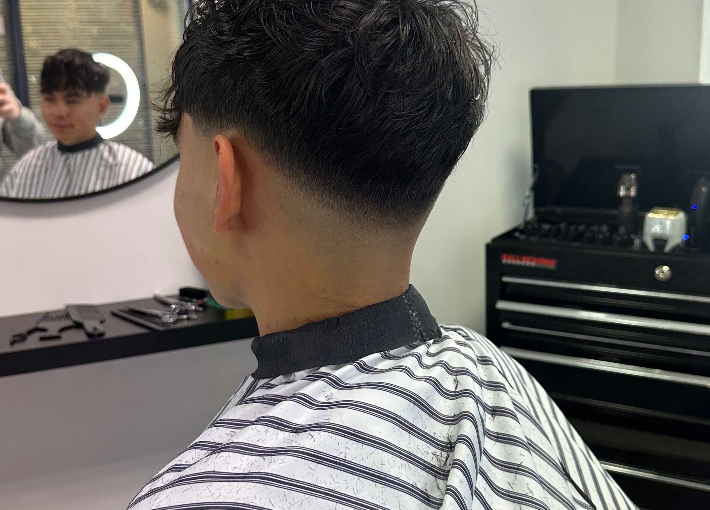 Modern fade haircut at True Fadez salon in Castletown, Castletown, IM, showcasing expert styling.