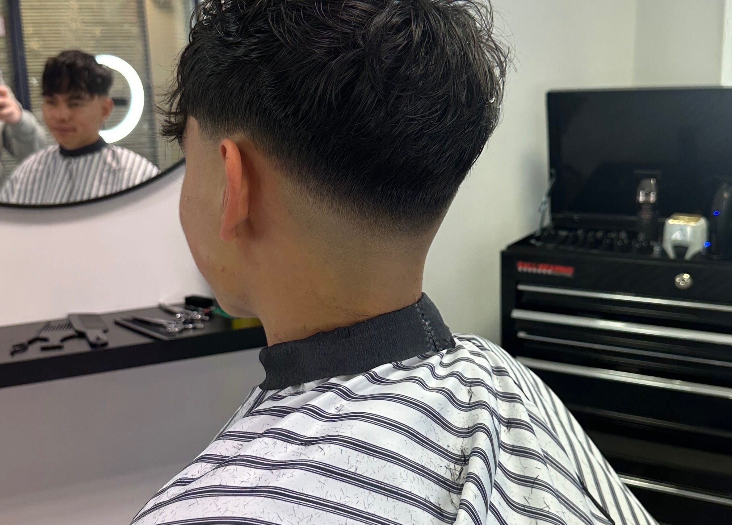 Modern fade haircut at True Fadez salon in Castletown, Castletown, IM, showcasing expert styling.