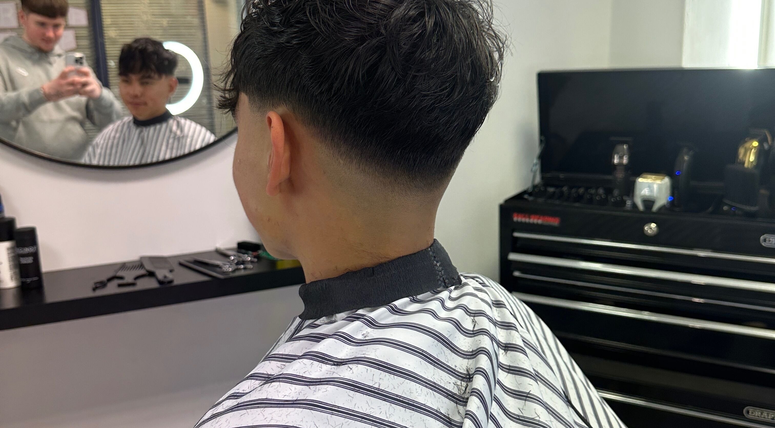Modern fade haircut at True Fadez salon in Castletown, Castletown, IM, showcasing expert styling.