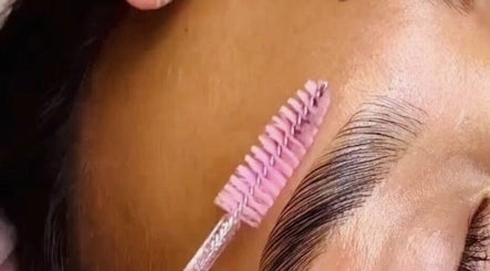 Eyebrow grooming at Khanyela Luxe Studio, Randburg, Gauteng, ZA, showcasing precise brush techniques.