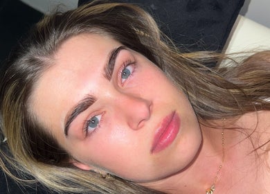 Close-up of a woman with glowing skin at Beauty By Chloe, Leeds, England, GB.