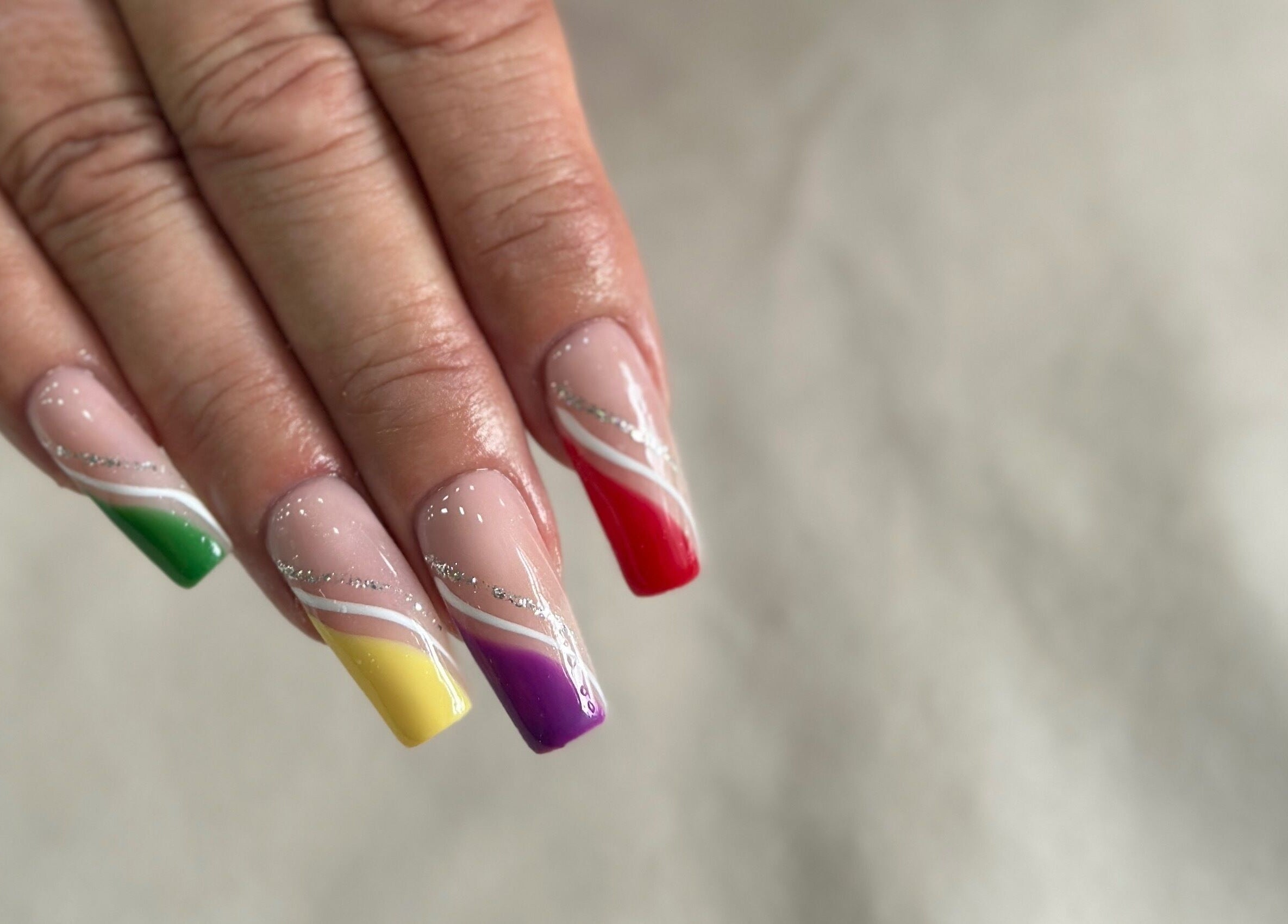 Colorful nail art at Vivid Nails&Beauty, Glasgow, Scotland, GB. Showcasing vibrant, artistic designs.