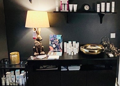 Elegant spa display at Forever Young Beauty, Tongham, England, GB, featuring luxurious skincare products.