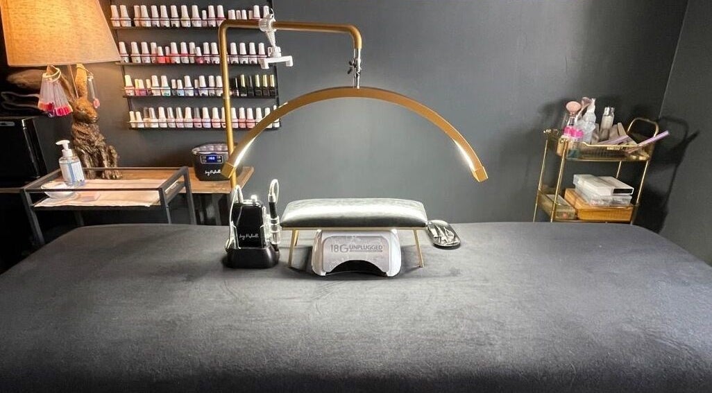 Nail salon table setup at Forever Young Beauty, Tongham, England, GB with elegant decor.