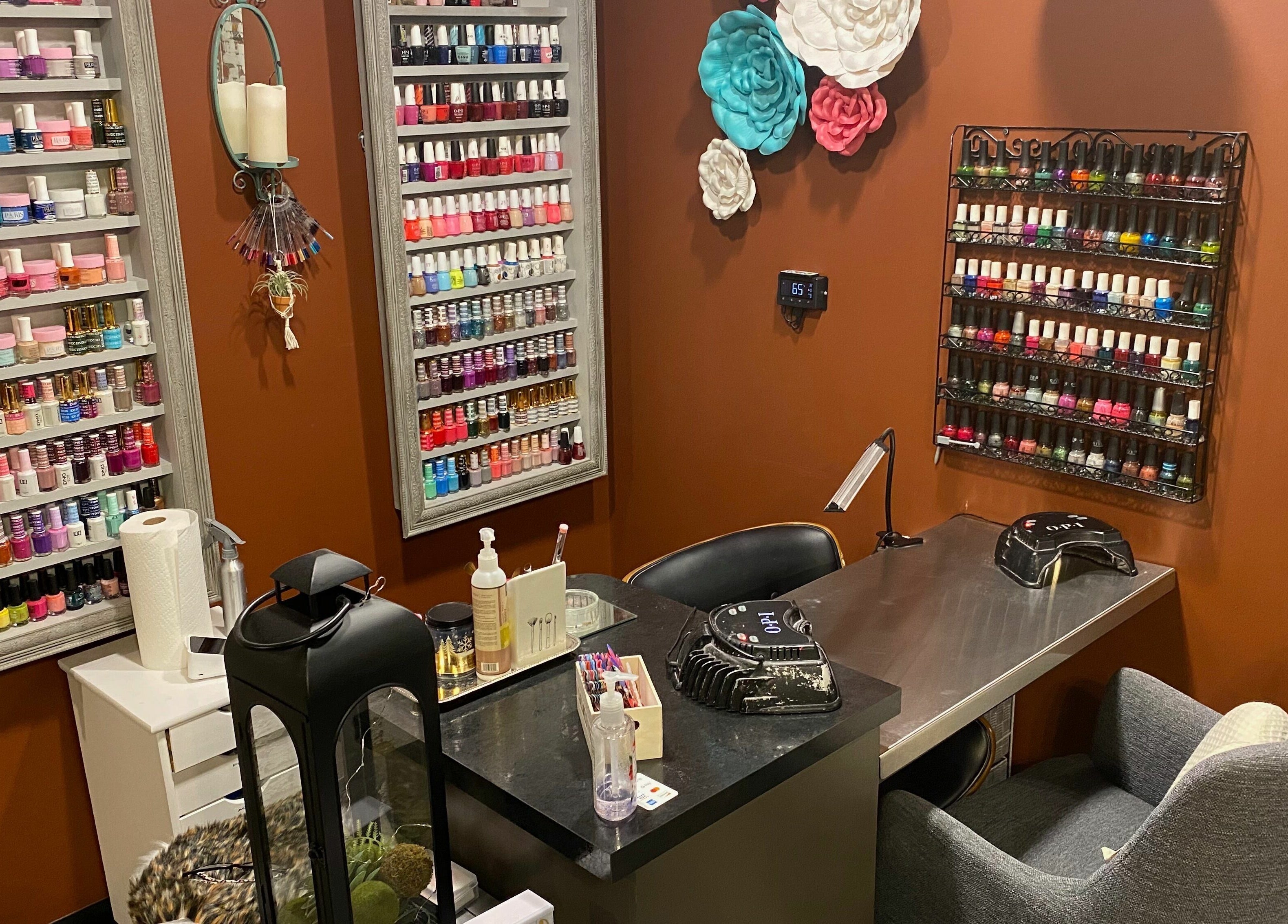 Colorful nail polish display at Studio 101 Salon and Spa in Swanton, Ohio, US enhances manicure experience.