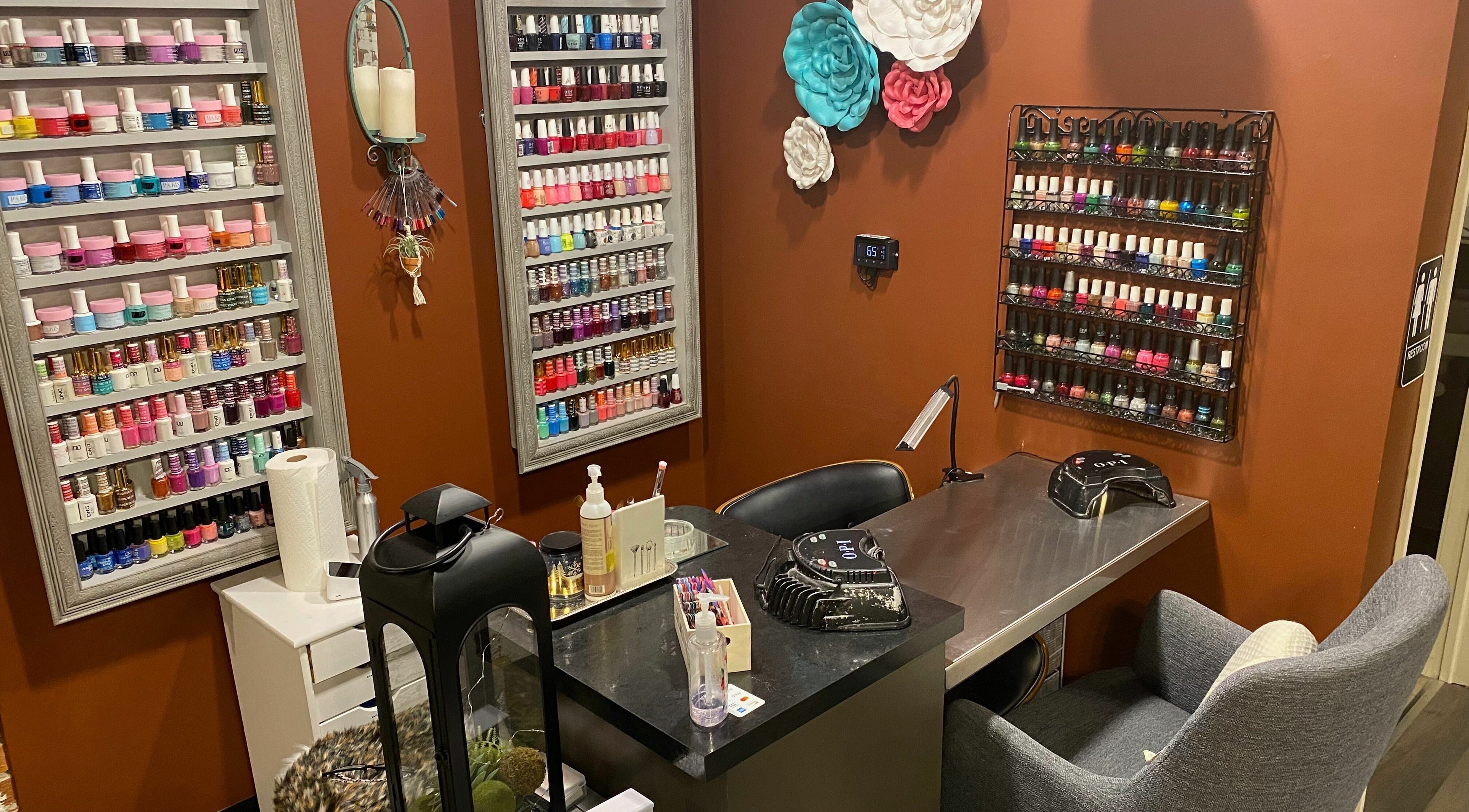 Colorful nail polish display at Studio 101 Salon and Spa in Swanton, Ohio, US enhances manicure experience.