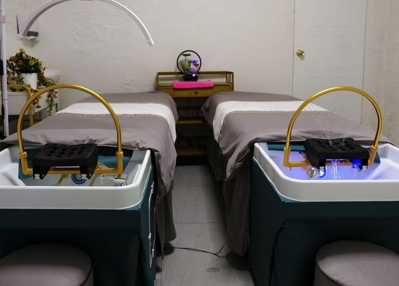 Tranquil spa beds at Renew Beauty Spa, Melbourne, Victoria, AU with elegant decor for a relaxing experience.