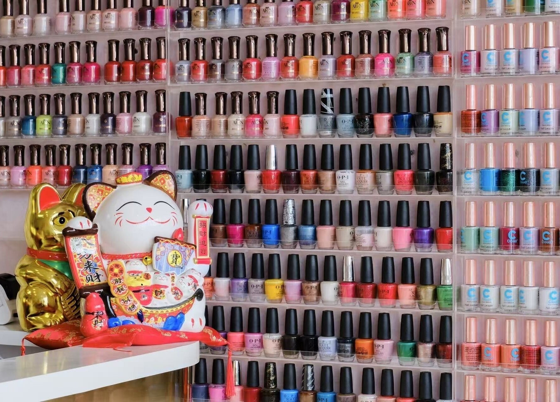 Vibrant nail polish display at Renew Beauty Spa, Melbourne, Victoria, AU showcasing a colorful collection.