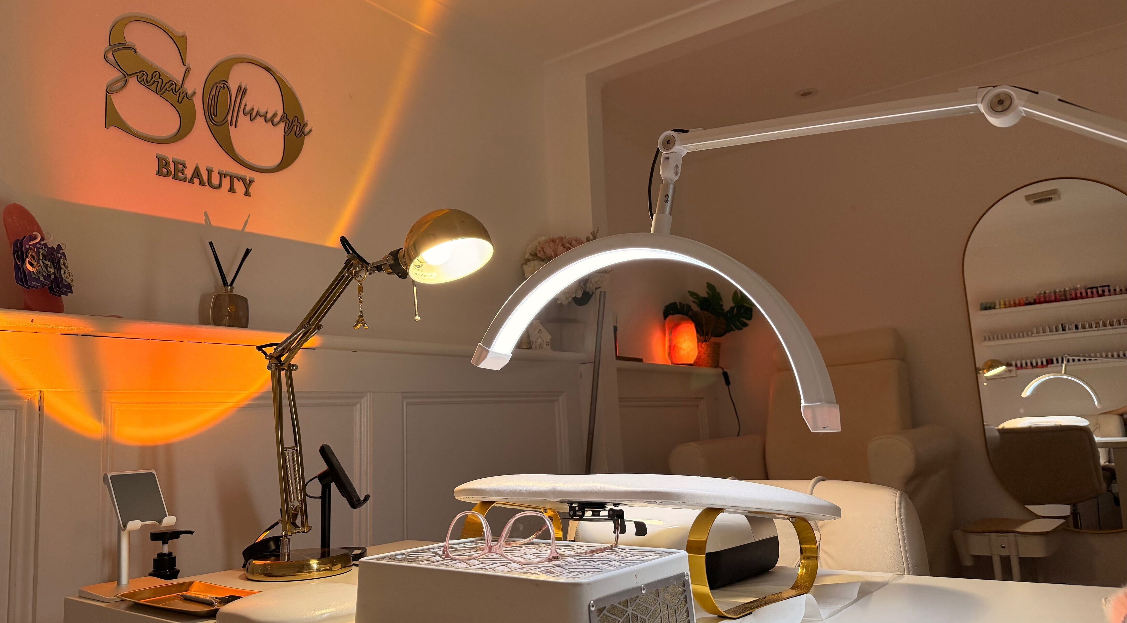 Elegant beauty treatment area at Sarah Ollivierre Beauty, London, England, GB, featuring modern decor and equipment.