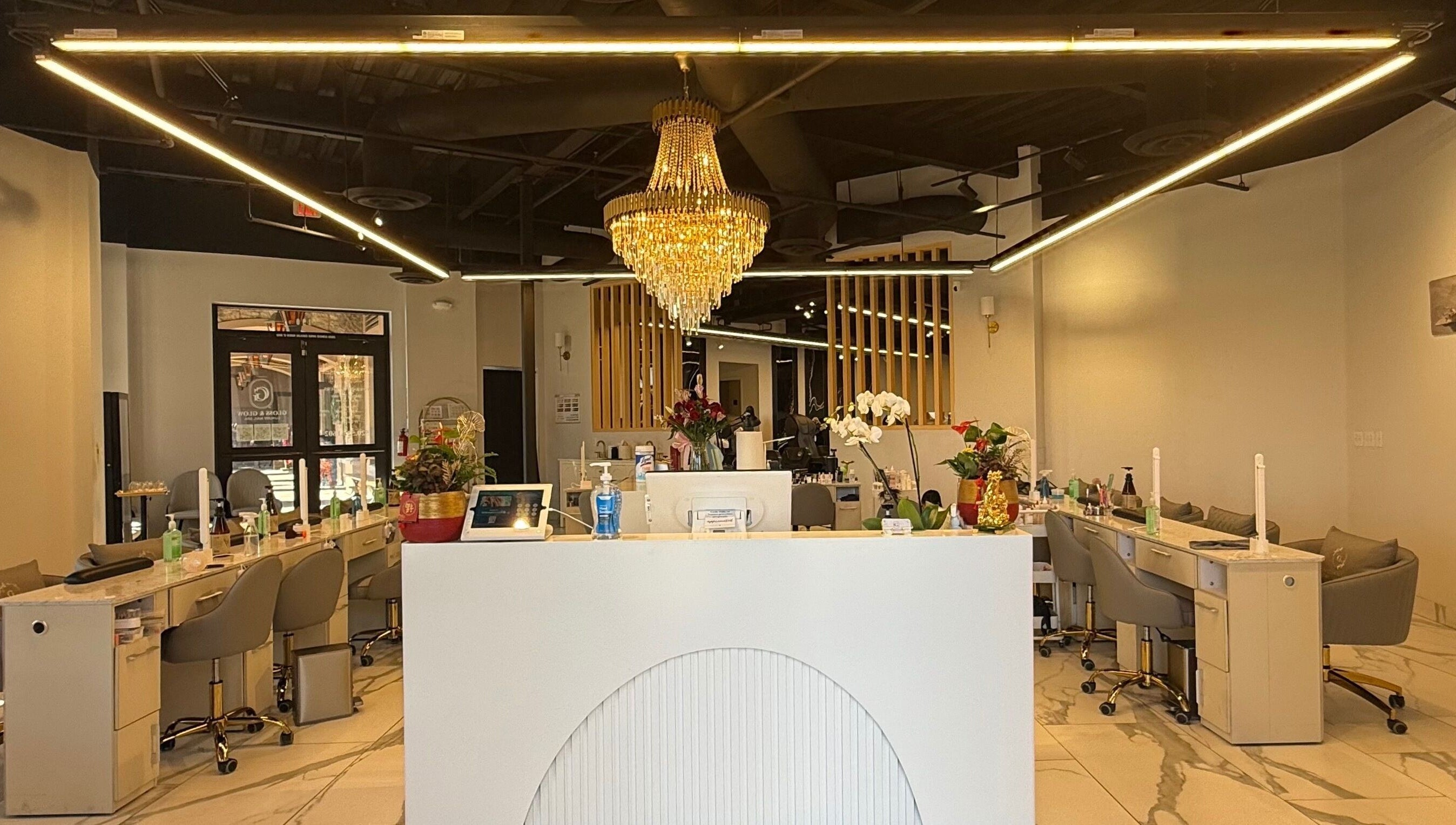 Gloss & Glow Luxury Nail Spa interior with chic chandeliers in Tucson, Arizona, US.