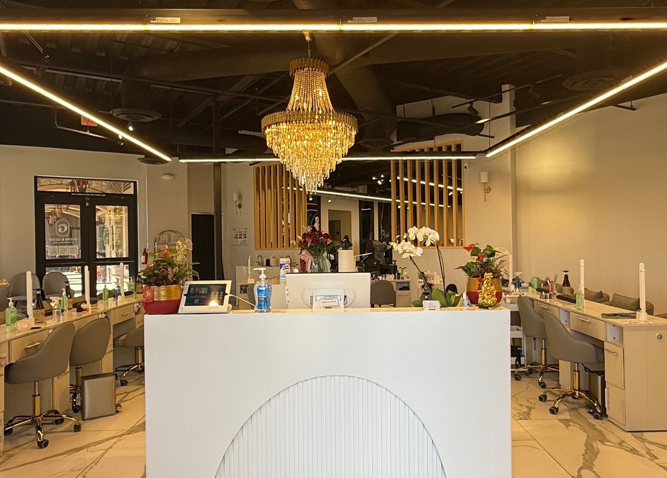 Gloss & Glow Luxury Nail Spa interior with chic chandeliers in Tucson, Arizona, US.