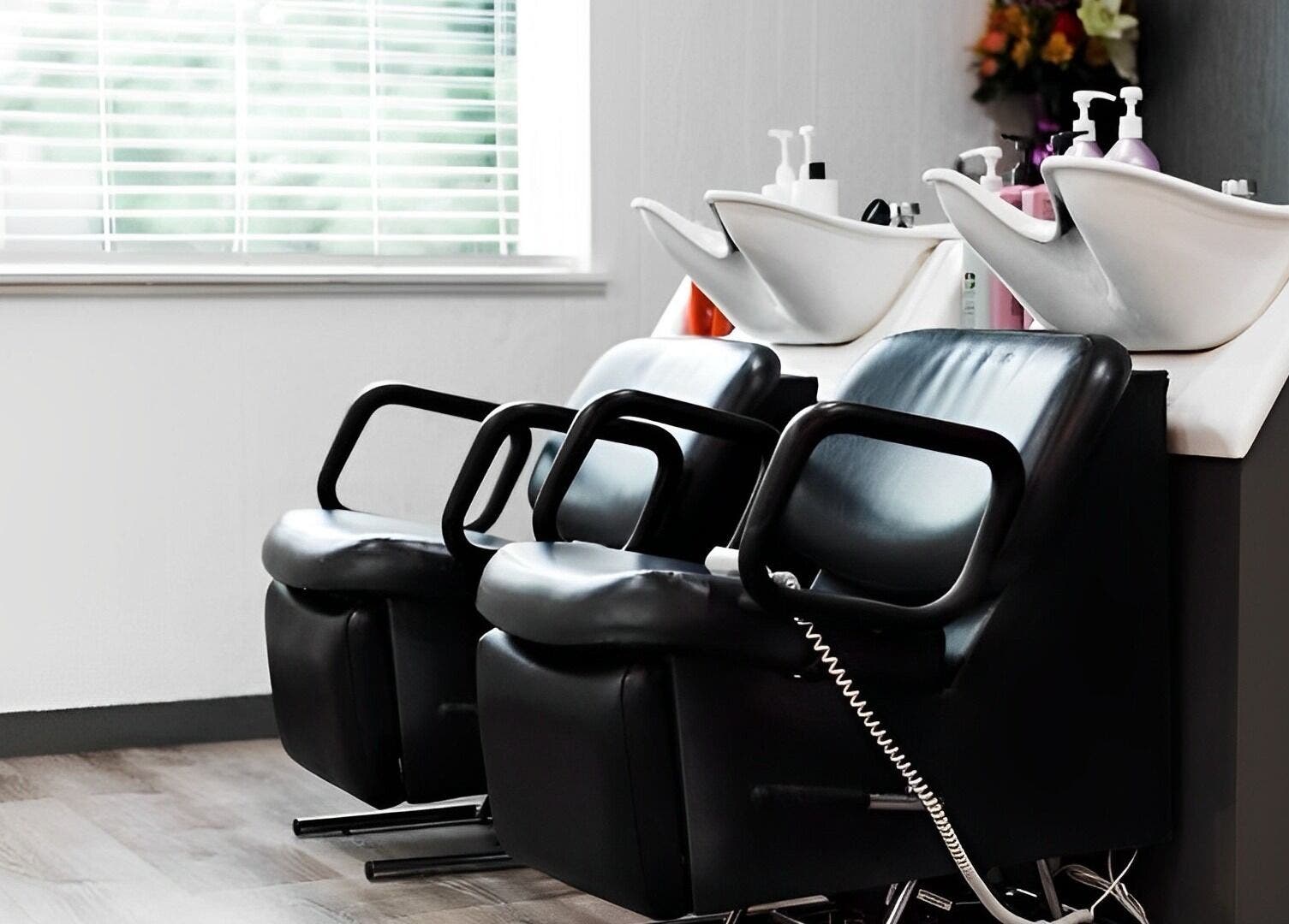 Stylish salon wash stations at Ivy Kae Studio, Valparaiso, Indiana, US designed for comfort and luxury.