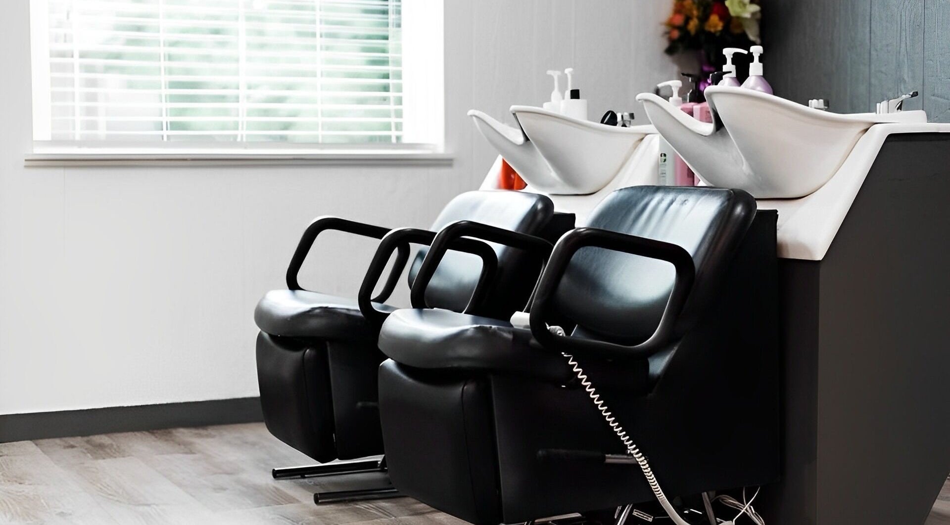 Stylish salon wash stations at Ivy Kae Studio, Valparaiso, Indiana, US designed for comfort and luxury.