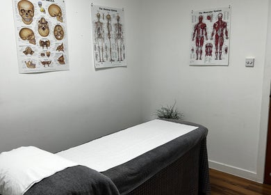 Treatment room at Mistry Osteopath South Ealing, London, England, GB, with anatomical posters.