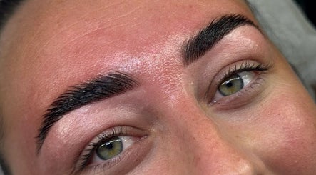 Close-up of perfectly shaped eyebrows at The Lash Lodge, Newry, Northern Ireland, GB. Enhancing natural beauty.