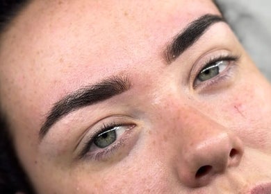 Close-up of expertly shaped brows at The Lash Lodge, Newry, Northern Ireland, GB showcasing precision beauty.