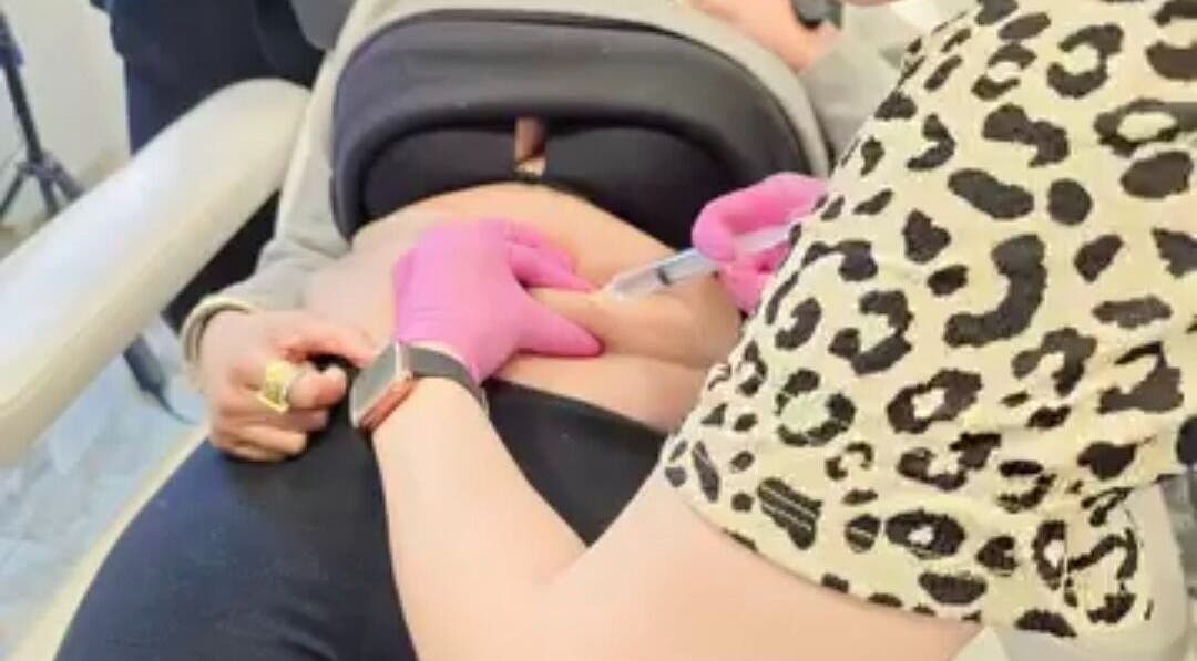 Expert beauty treatment at Glowtonix, Borehamwood, England, GB, showcasing detailed care and professionalism.