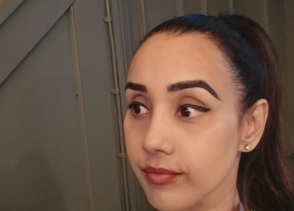 Woman with polished eyebrows and sleek look at Glowtonix, Borehamwood, England, GB.