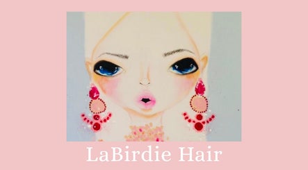 Artistic portrait at La Birdie Hair, Melbourne, Victoria, AU, showcasing stylish earrings and makeup.