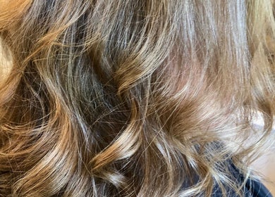 Golden wavy hair styled at LaBirdie Hair, Frankston Sth, Victoria, AU.