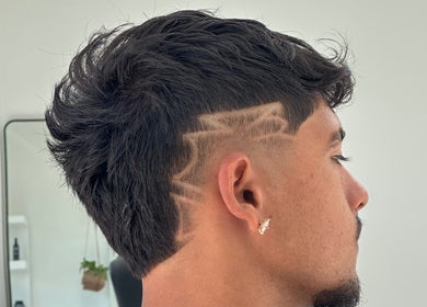 Detailed hair design at Kanati Studios, Greenvale, Victoria, AU showcasing creative barber skills.