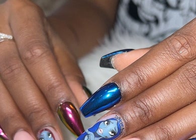 Colorful nail art at Nailz By Sandy, Adjala-tosorontio, Ontario, CA showcasing vibrant designs.