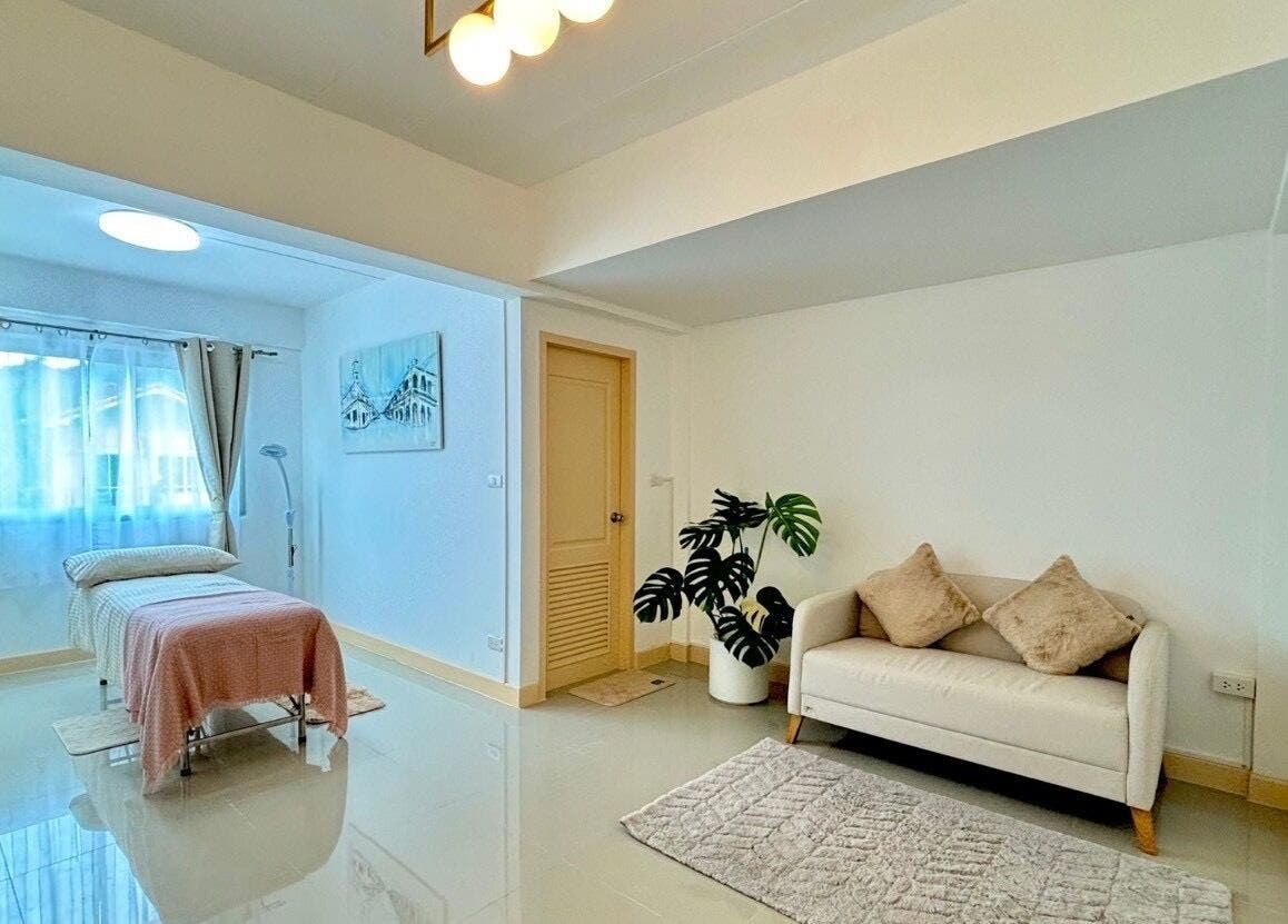 Elegant massage room at Bliss Wax in ตำบล ศรีสุนทร, ภูเก็ต, TH with cozy bed and soft lighting.