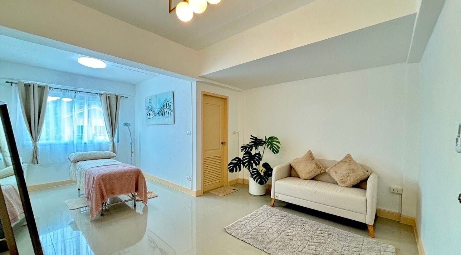 Elegant massage room at Bliss Wax in ตำบล ศรีสุนทร, ภูเก็ต, TH with cozy bed and soft lighting.