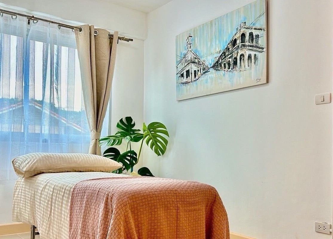 Tranquil massage room at Bliss Wax, ตำบล ศรีสุนทร, ภูเก็ต, TH, with plush bed and soothing decor.