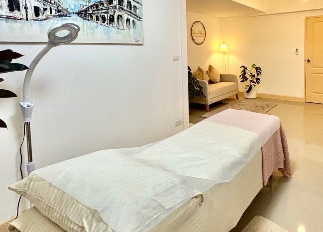 Relaxing treatment room at Bliss Wax, ตำบล ศรีสุนทร, ภูเก็ต, TH featuring a cozy couch and calming decor.