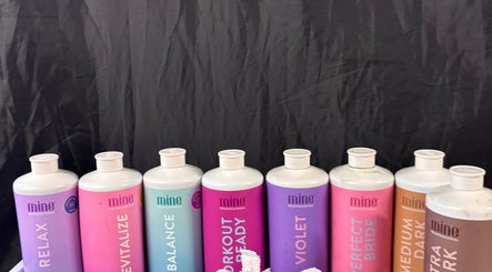 Vibrant range of Mine Professional bottles at Golden Hour in Gore, Southland, NZ.
