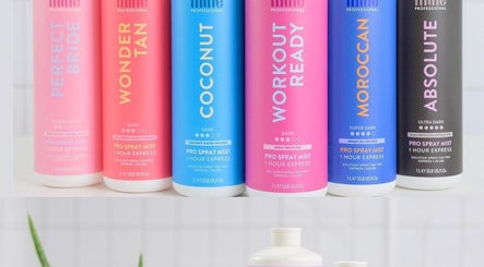 A vibrant array of spray tan bottles at Golden Hour, Gore, Southland, NZ. Perfect for glowing skin.