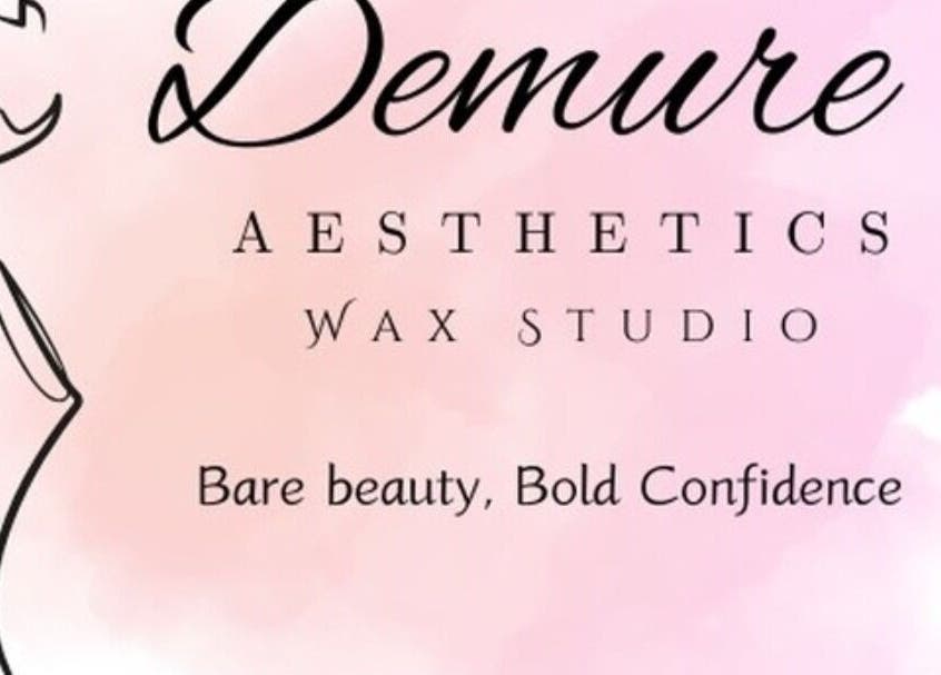 Demure Aesthetics logo on a pink backdrop at 6729+8V Providence, Tobago, TT, offering waxing and beauty services.