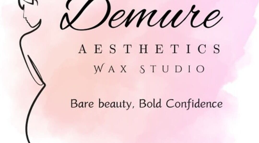 Demure Aesthetics logo on a pink backdrop at 6729+8V Providence, Tobago, TT, offering waxing and beauty services.