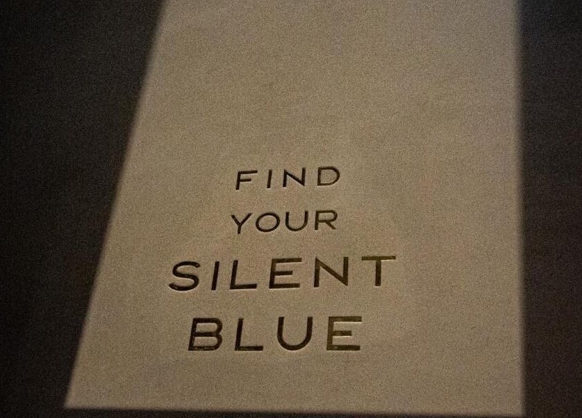 Signage with 'Find Your Silent Blue' at Silent Blue Barbershop, Hong Kong, HK.