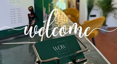Welcome sign at WoW Beauty Lab in Ljubljana, Ljubljana, SI, showcasing a warm and inviting entrance.