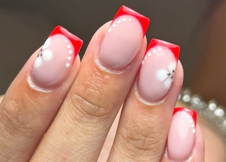 Stylish red-tipped nail art at Beauty By Amelia, Clanfield, England, GB offering expert manicure services.